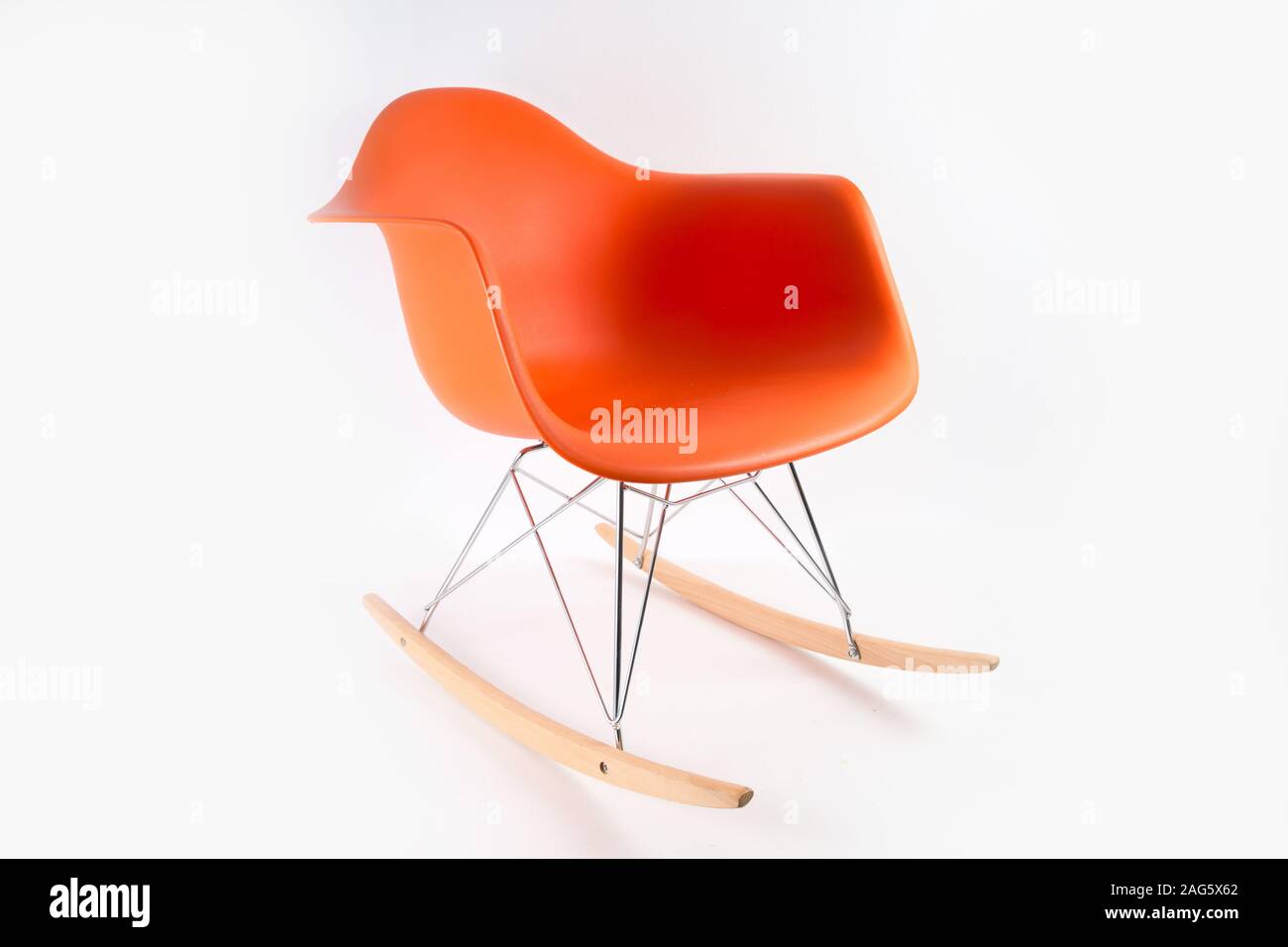 Orange rocking chair isolated on a white background Stock Photo - Alamy