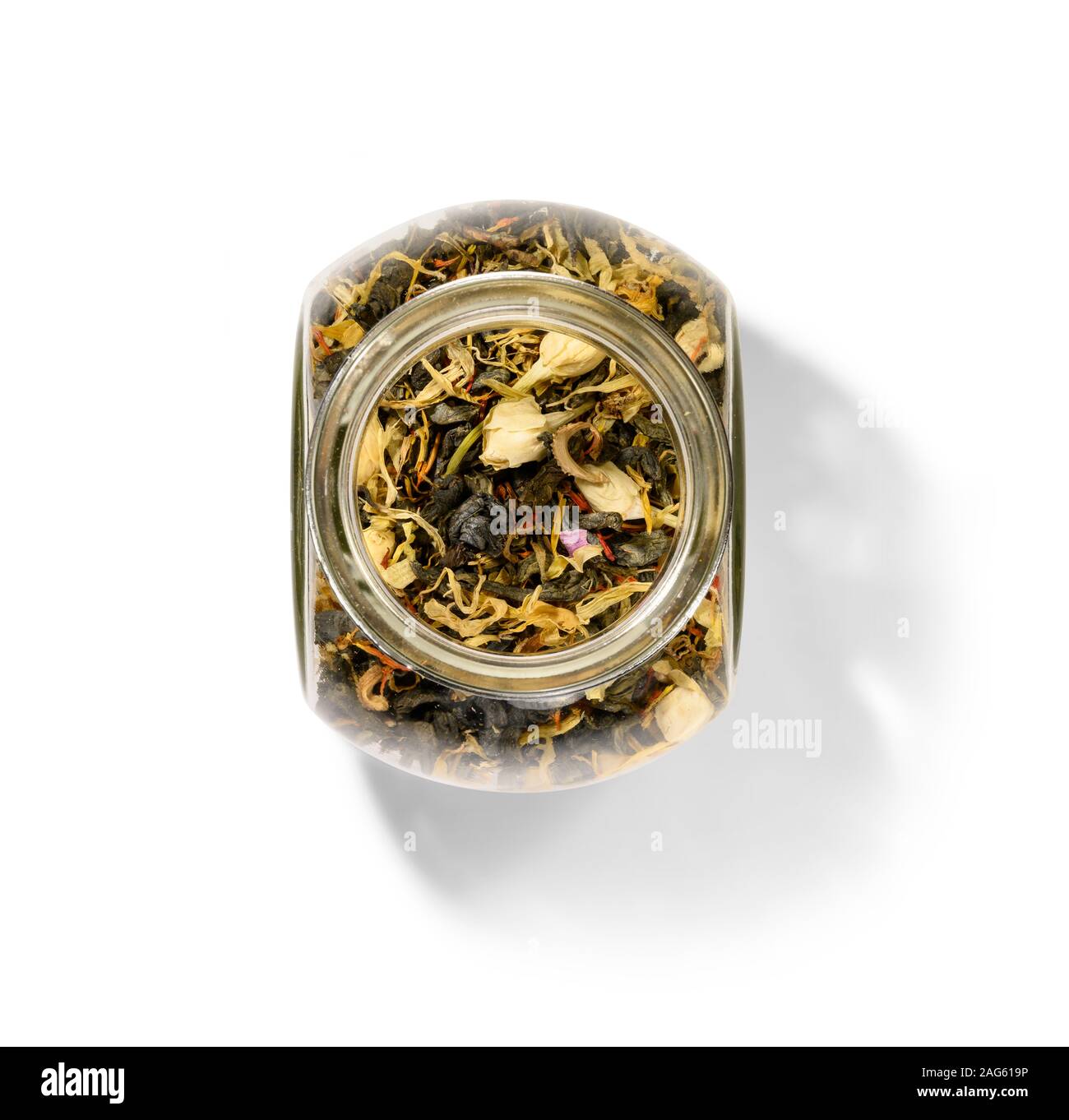 Green tea with aromatic additives. Top view on white background Stock ...