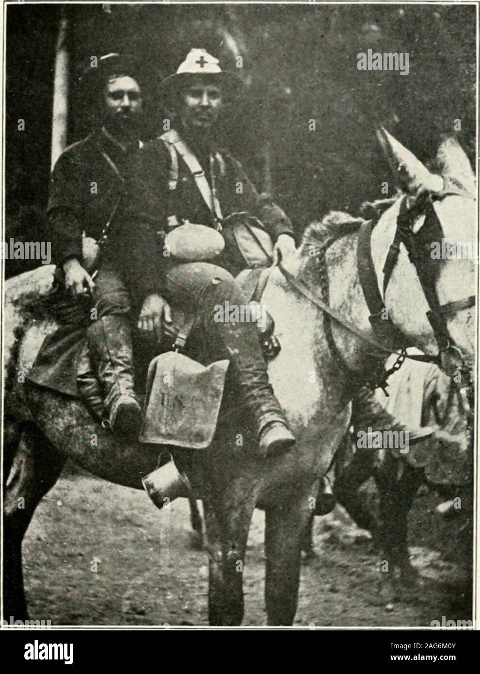 . History of companies I and E, Sixth Regt., Illinois Volunteer Infantry from Whiteside County. Containing a detailed account of their experiences while serving as volunteers in the Porto Rican campaign during the Spanish-American war of 1898. Also a record of the two companies as state troops from the date of organization to April 30th, 1901. re-mained awake till morning. Shortly after daylight adetail of men went back to the wagon train and broughtus rations. We crawled to the eastern slope of themountain and basking in the warm sun, dried our cloth-ing. Looking back in the direction from wh Stock Photo