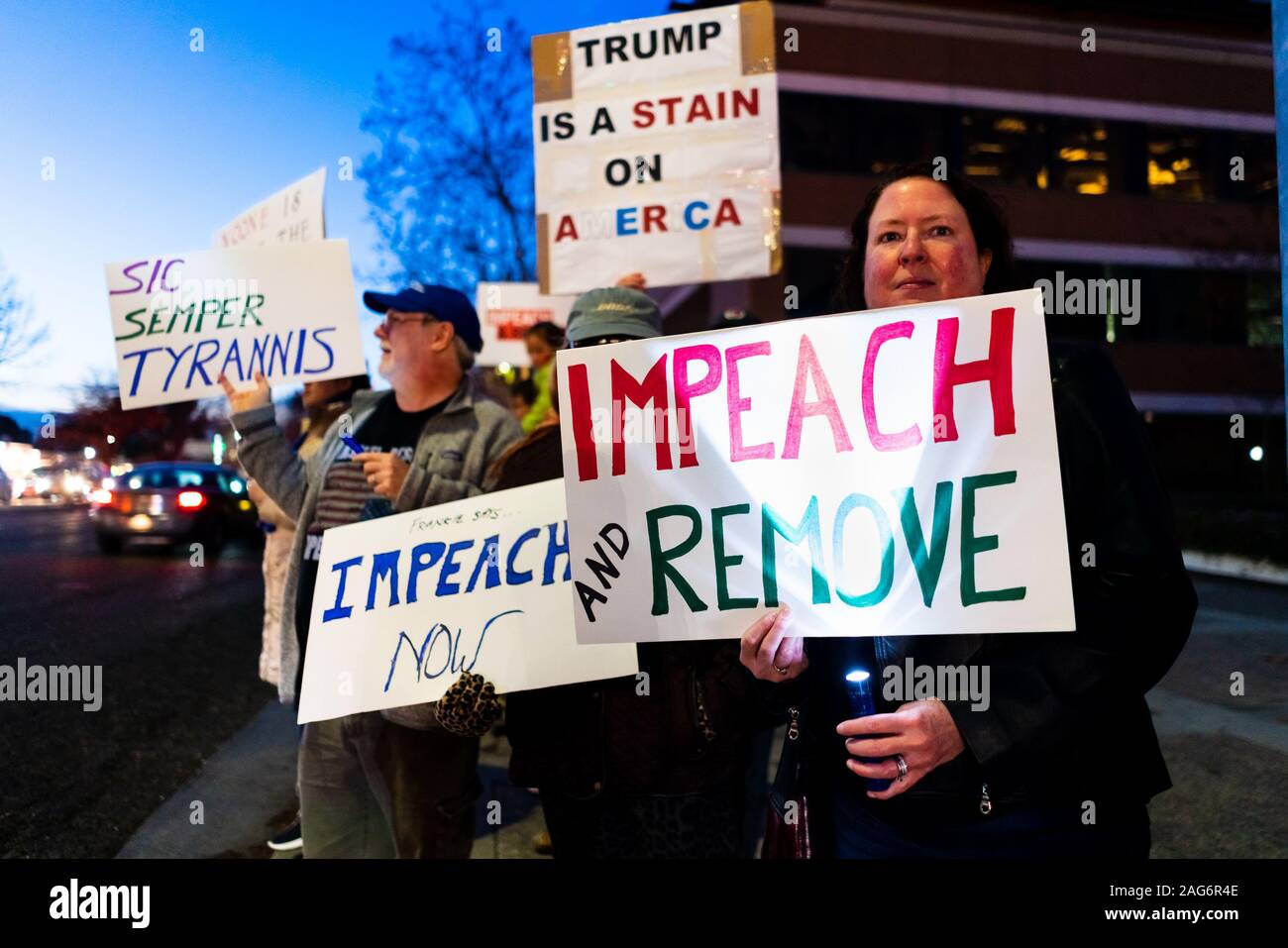 Dec 17, 2019 Mountain View / CA / USA - Impeach and remove and other signs carried by the protesters participating at the Impeachment Eve Vigil rally Stock Photo