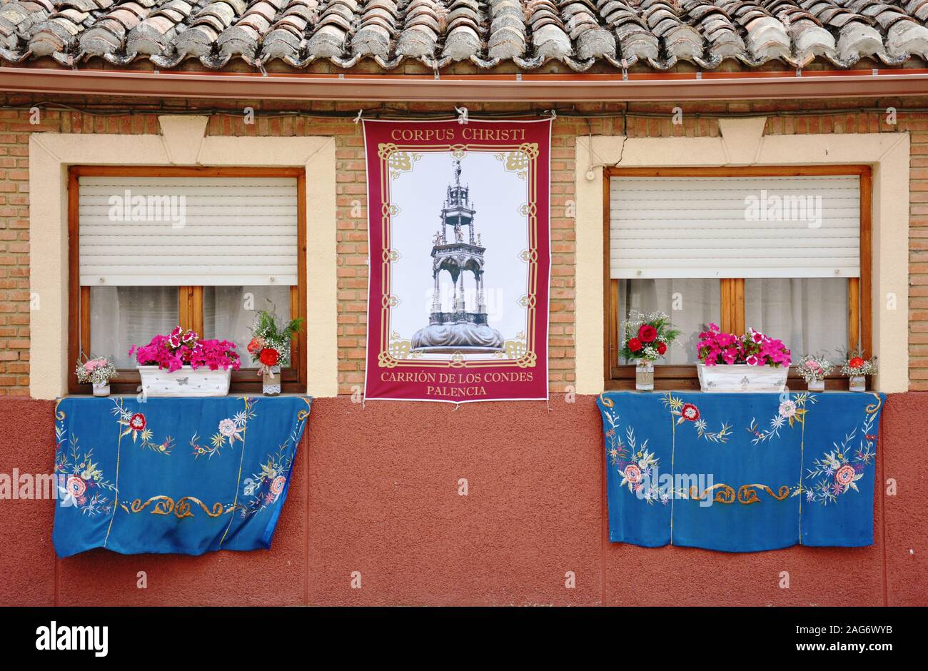 window decorated with pink flowers Stock Photo