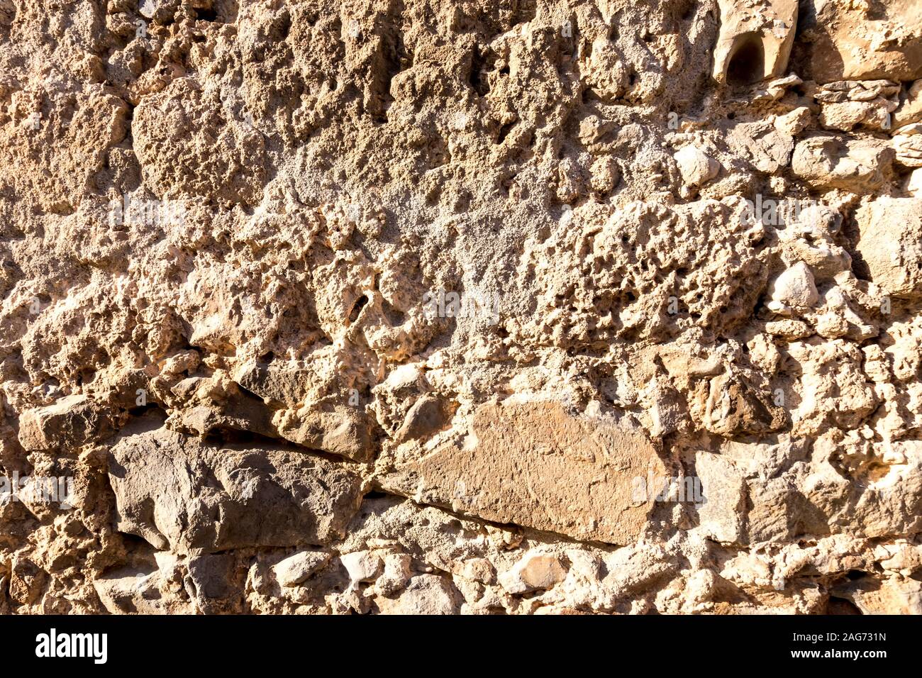 Background of ancient stone wall. Texture of old brick Stock Photo - Alamy