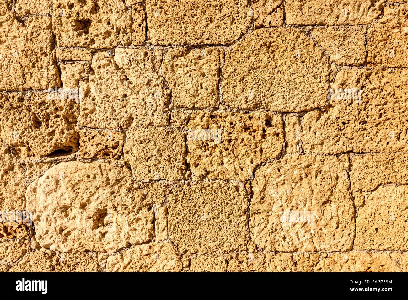 Background of ancient stone wall. Texture of old brick Stock Photo - Alamy