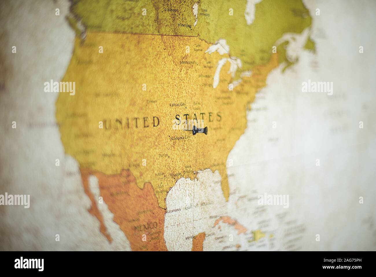 Selective focus shot of a black pin on the United States country on the map Stock Photo