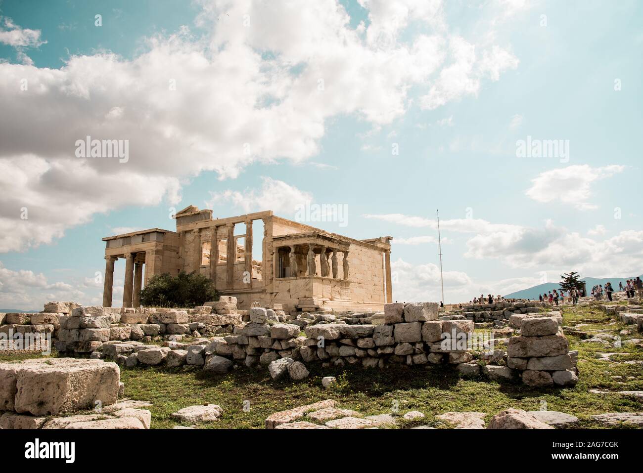 Beautiful shot of the Erechtheion Greek temple in Athens under the cloudy sky Stock Photo