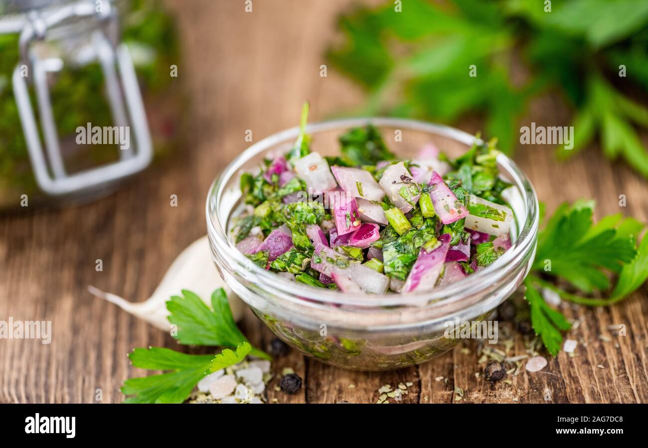Fresh Homemade Chimichurri as detailed close-up shot (selective focus) Stock Photo