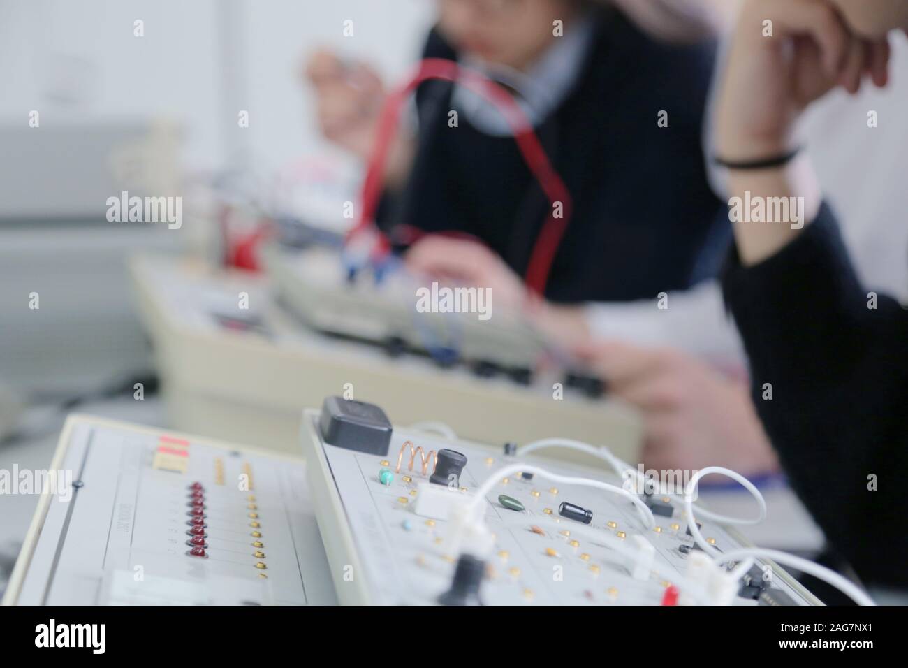 Technical Lesson Two young students in technical vocational training, the lesson in ...