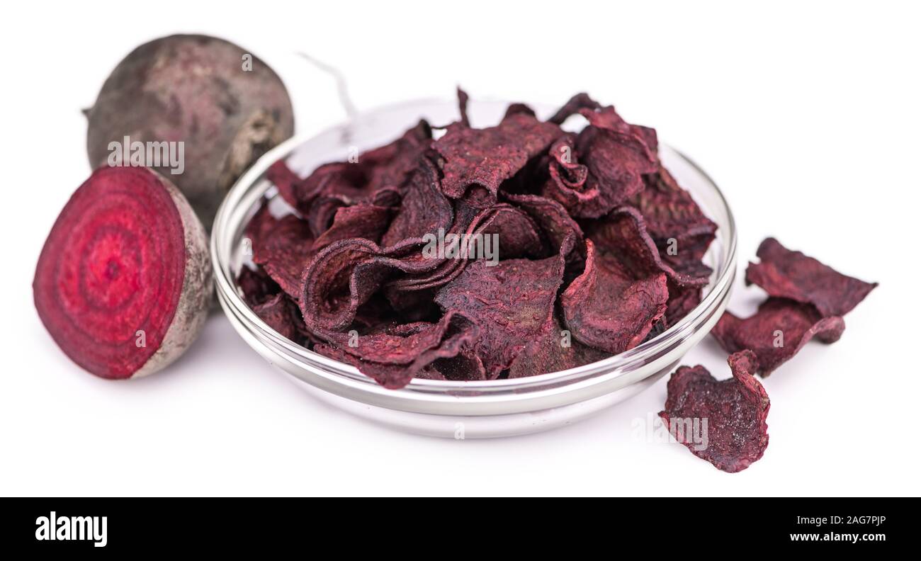 Portion of Beetroot Chips isolated on white background (selective focus) Stock Photo