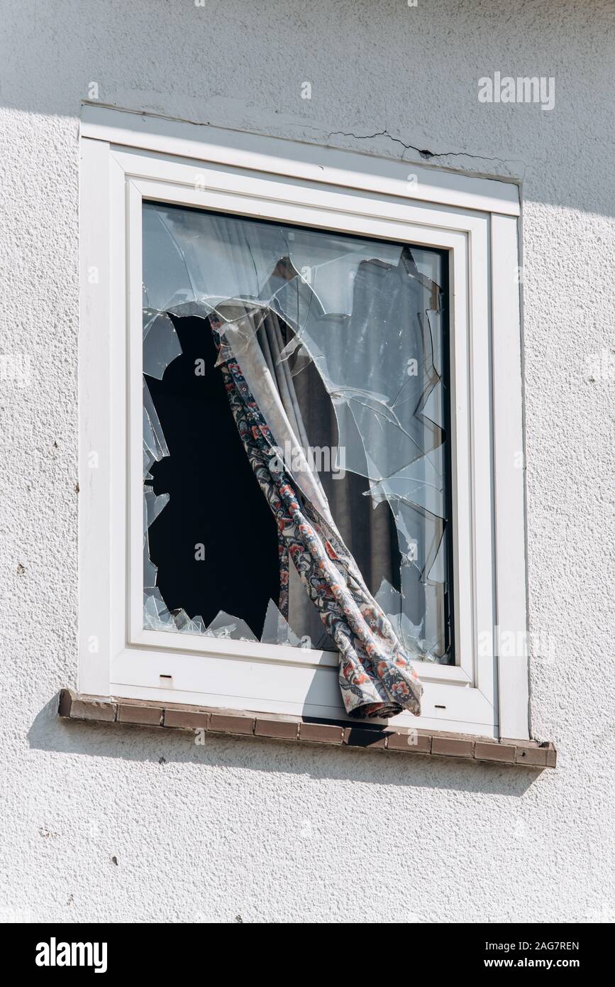 Broken Windows in the house. Shards of glass remained in the window