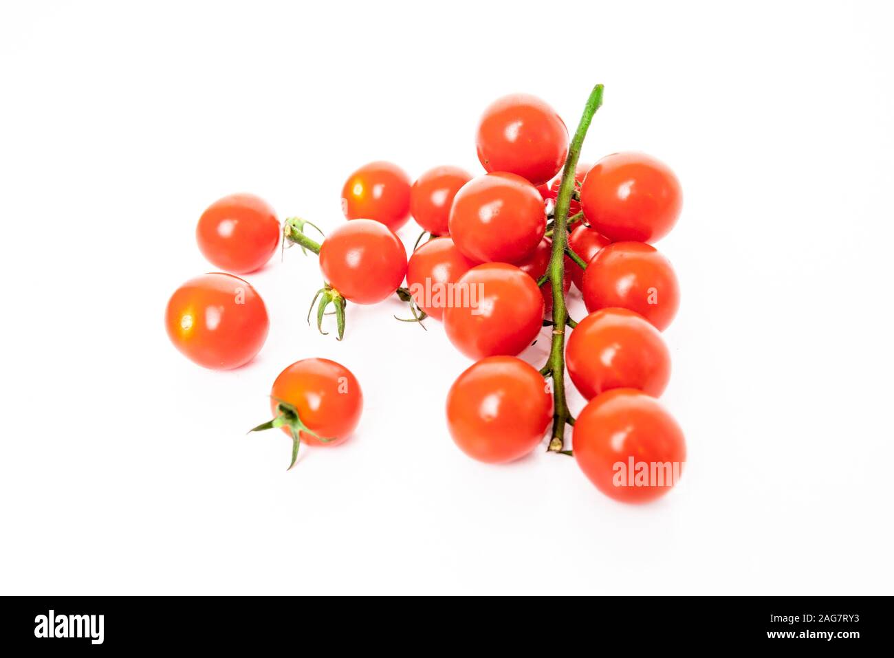 Cherry tomatoes isolated on white background Stock Photo - Alamy