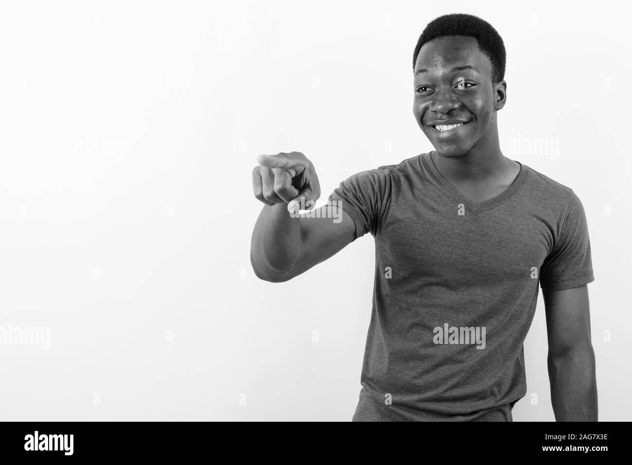 Young handsome African man against white background Stock Photo - Alamy
