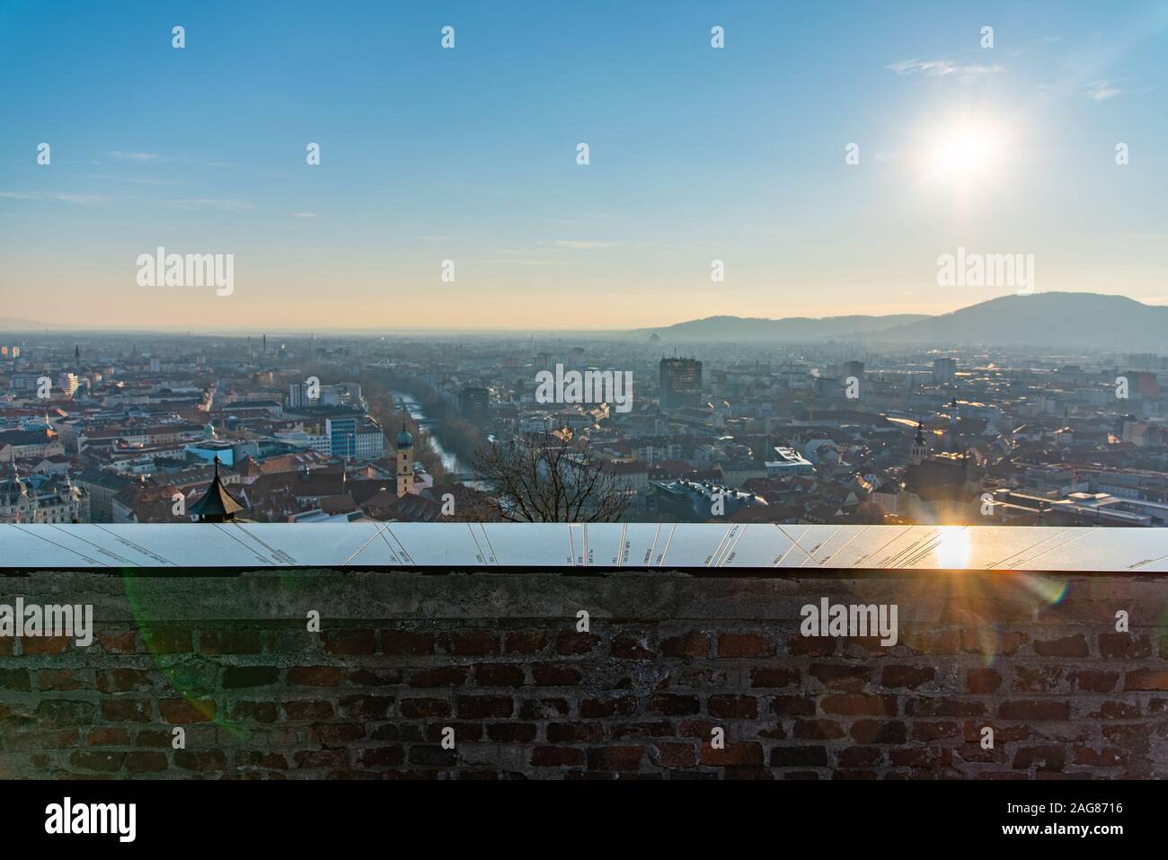 Schlossberg Castle mountain in Graz. Map wall with directions of cities all over the world. Stock Photo