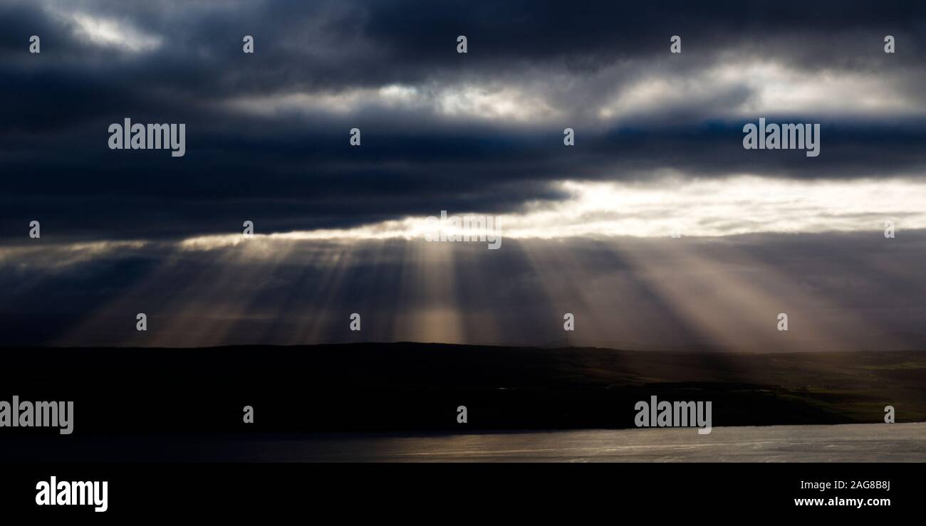 Crepuscular rays over Black Isle, Cromarty Firth Stock Photo