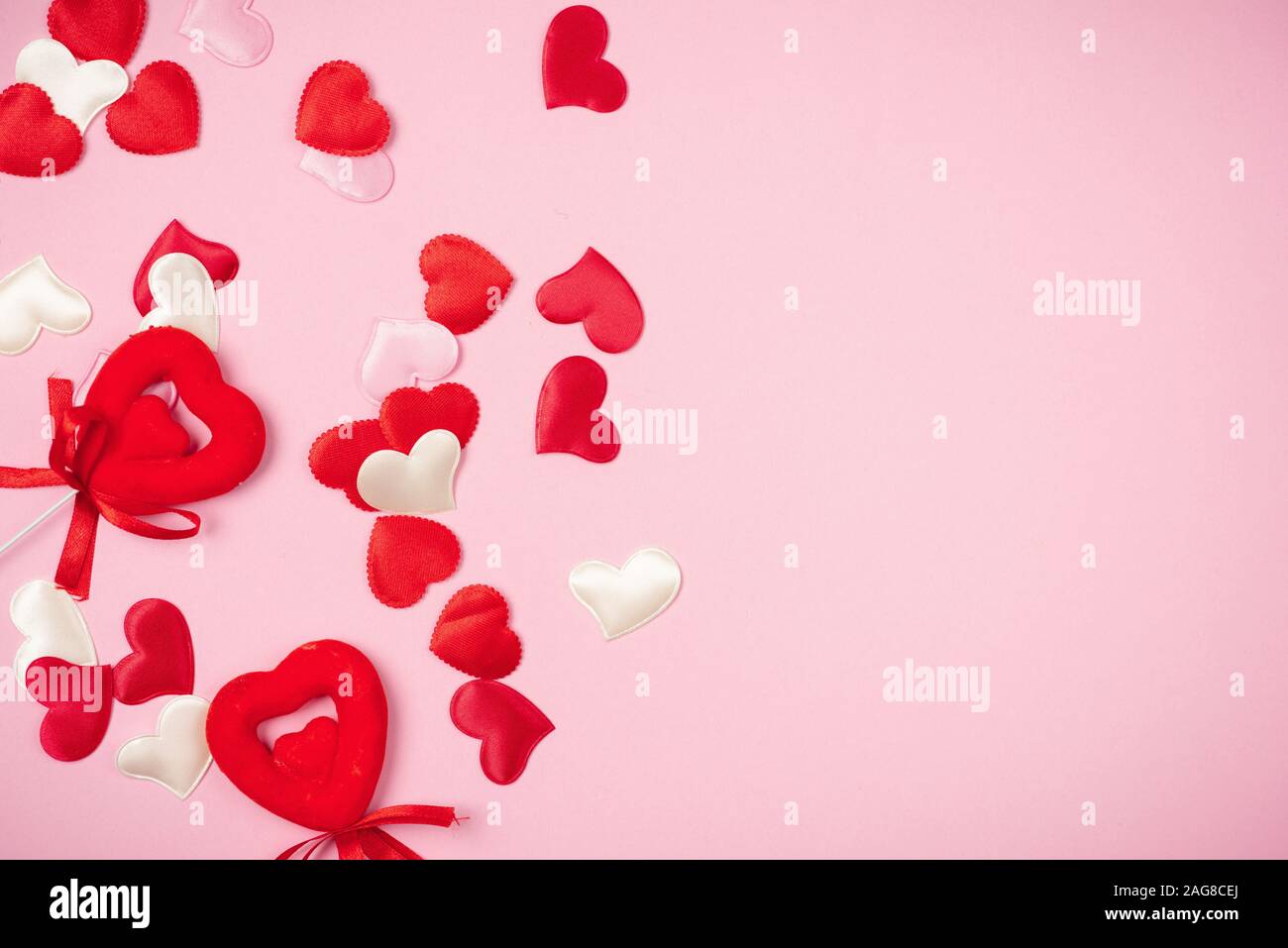 Red hearts for Valentine's day on a beautiful pink background Stock ...