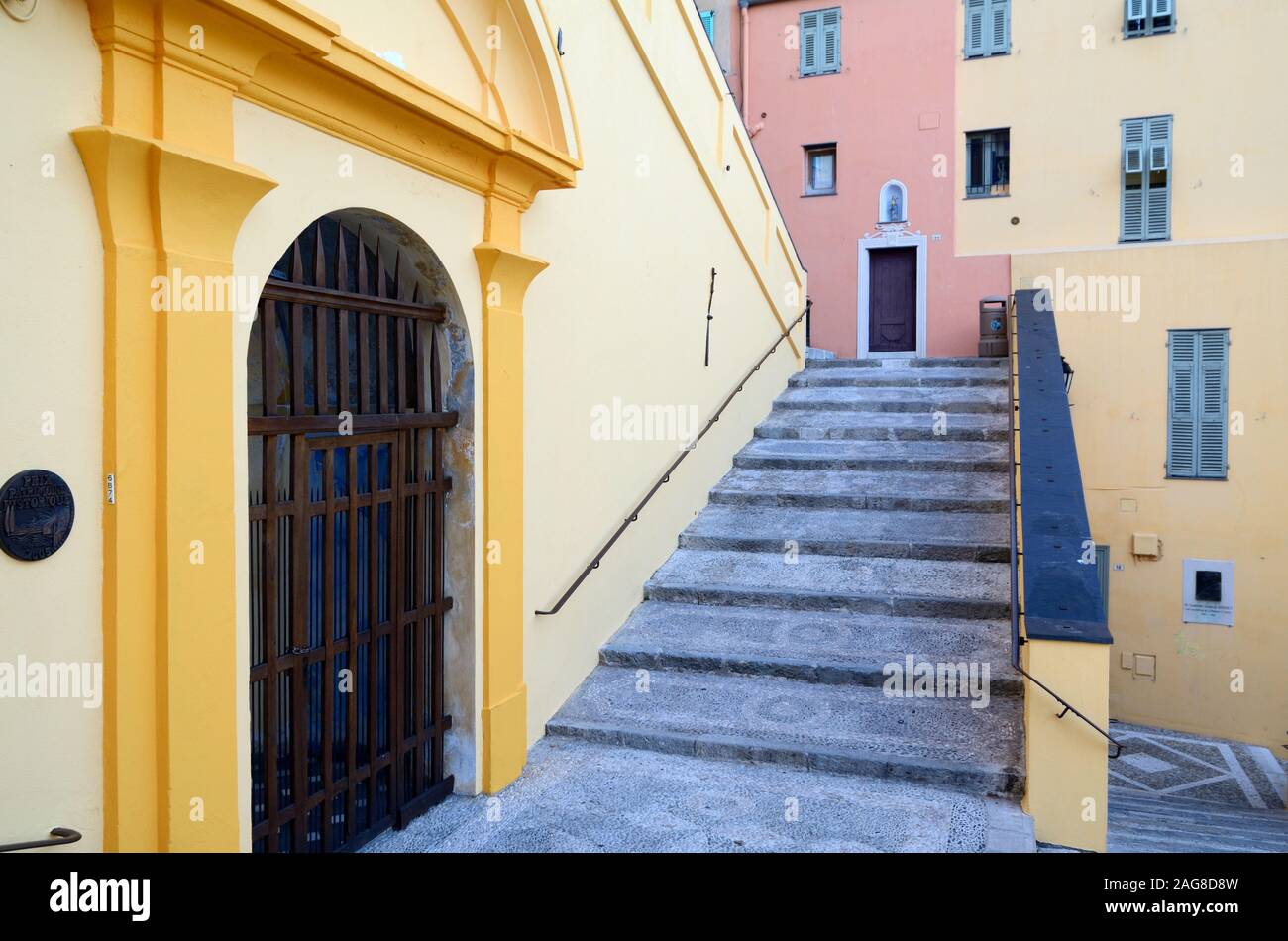 Saint Michel Steps & Colourful Traditional Architecture in the Old Town or Historic District Menton Alpes-Martimes France Stock Photo