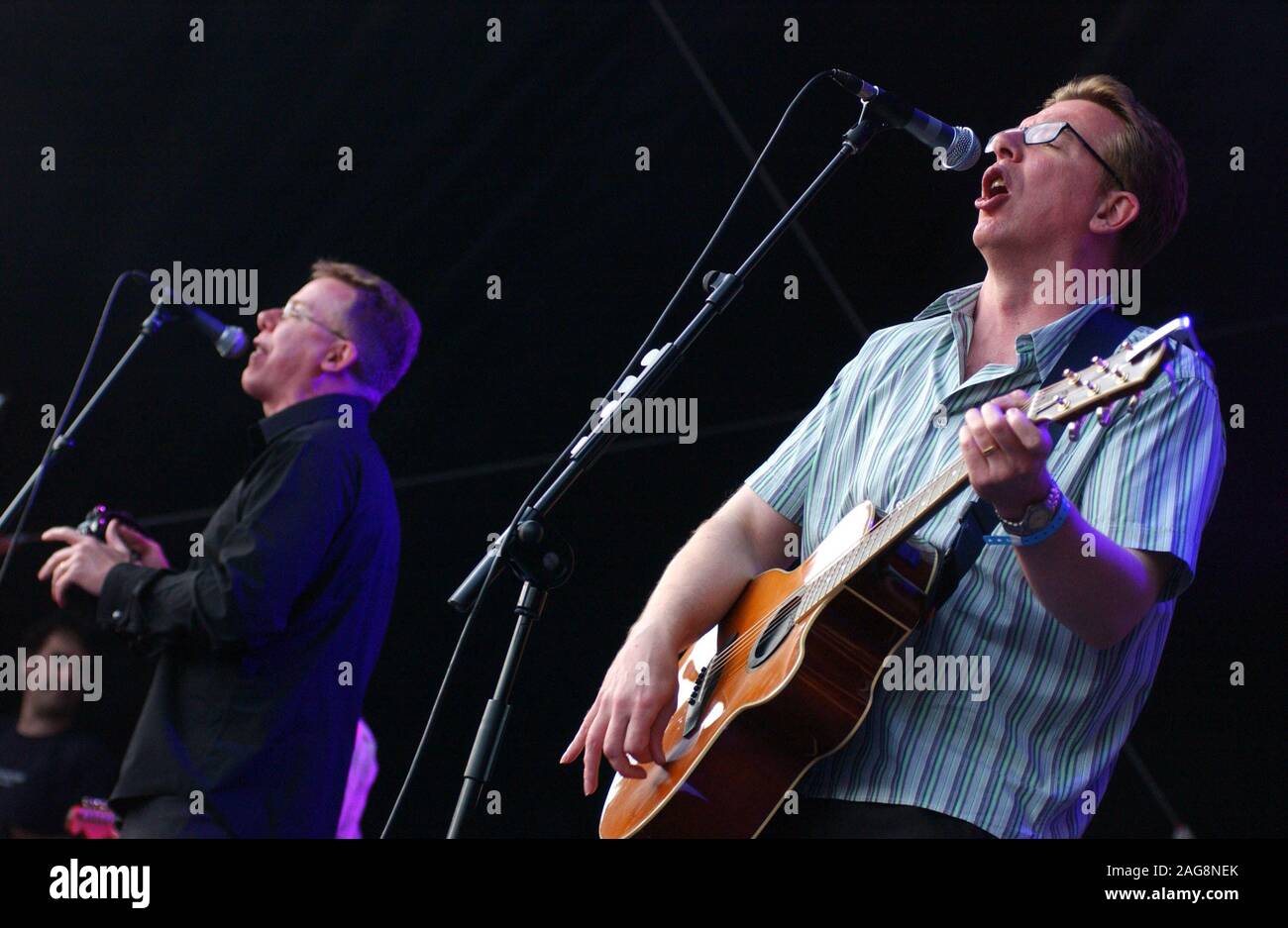 The Proclaimers, twin brothers Charlie and Craig Reid, perform at The Big Weekend Summer Festival in Cardiff tonight. ( Sunday 3/8/03). Stock Photo