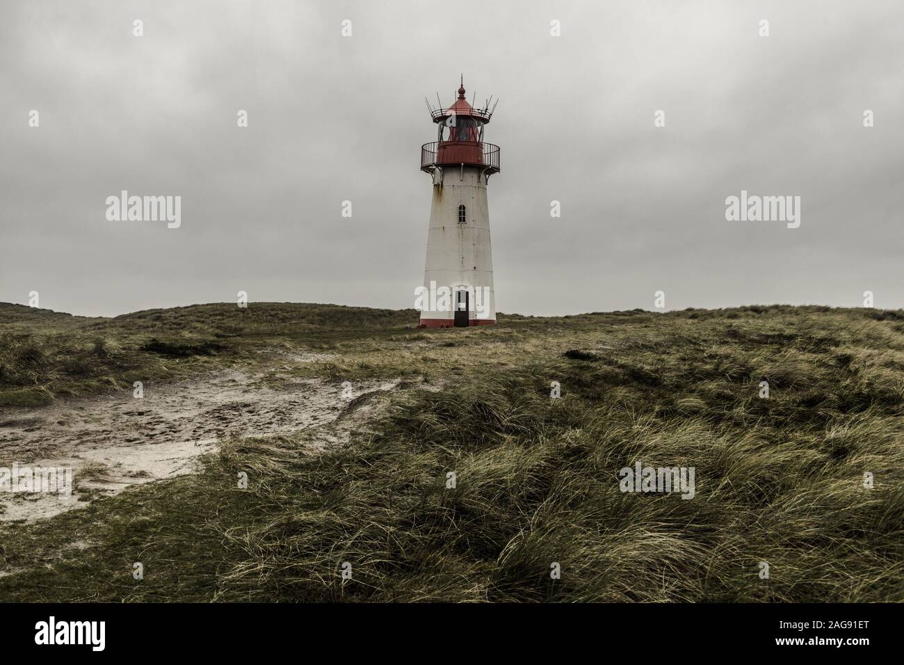 Low angle shot of the Lighthouse List East at Sylt, Germany under the storm clouds Stock Photo
