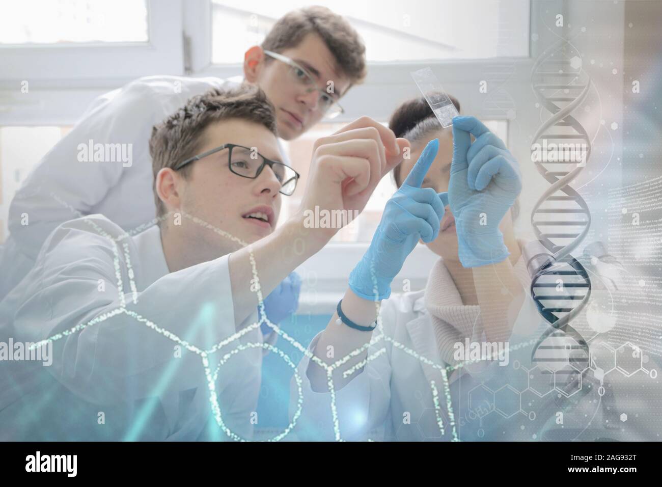 Group of young Laboratory scientists working at lab with test tubes and ...
