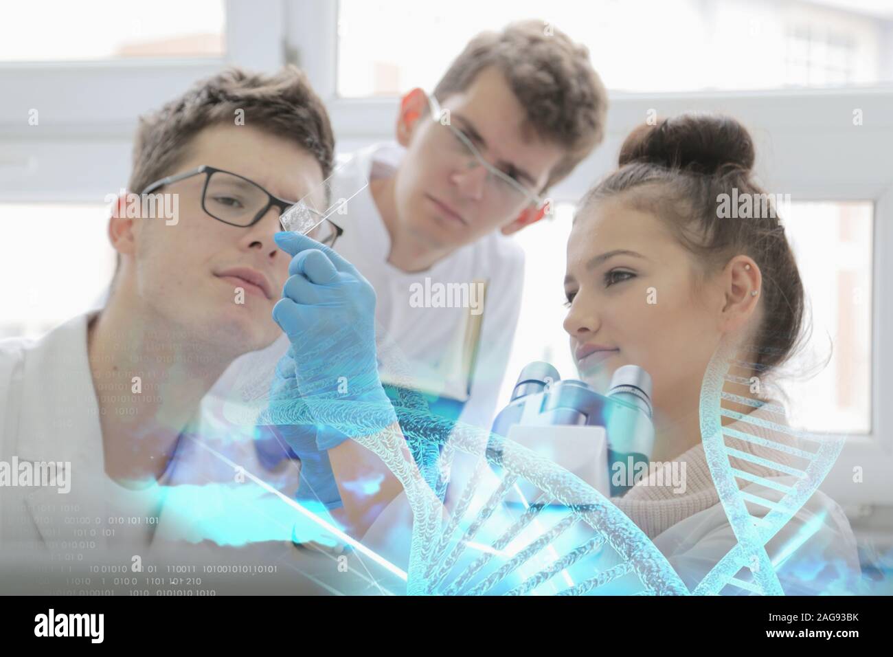 Group of young Laboratory scientists working at lab with test tubes and ...