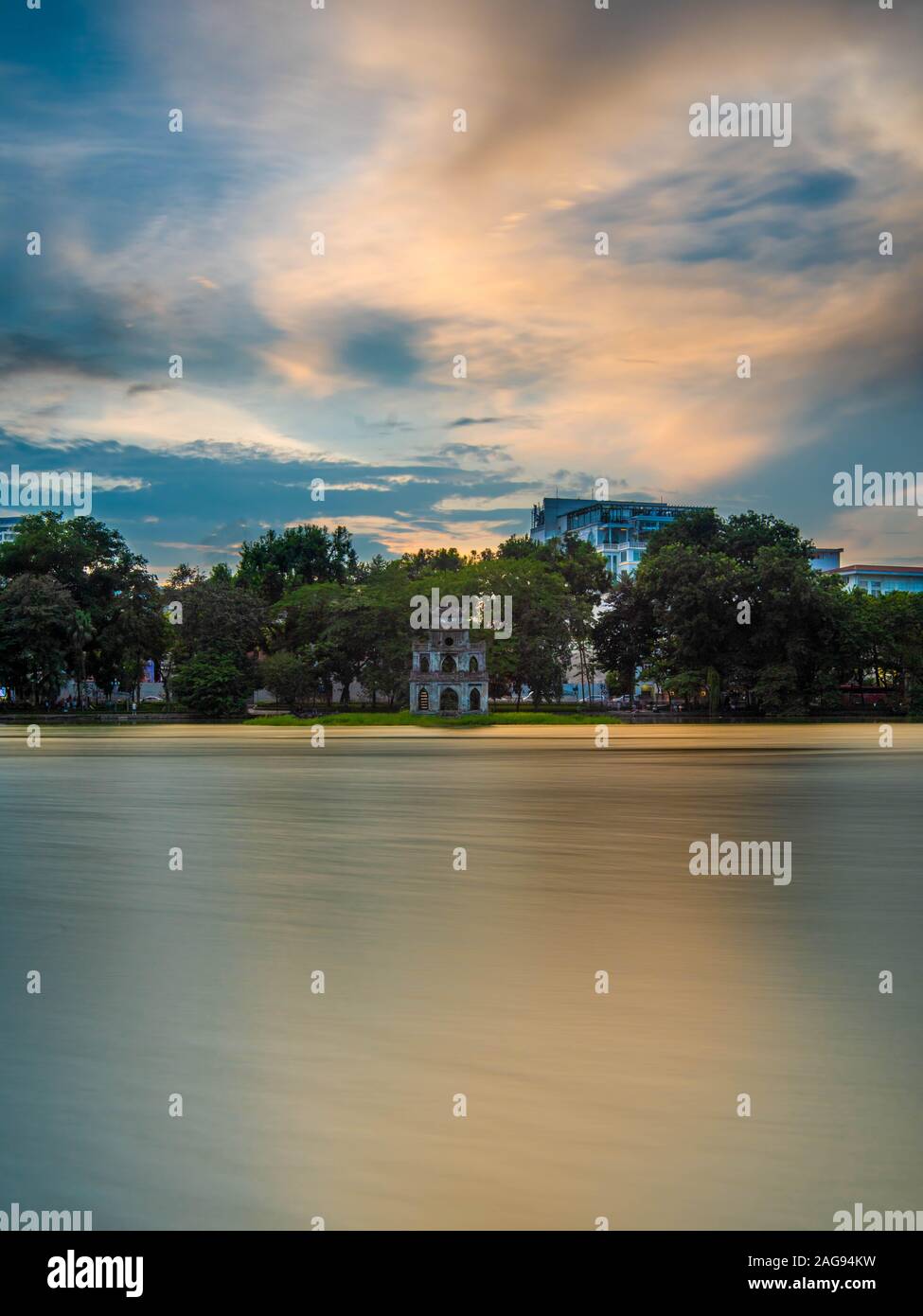 Turtle Tower at sunset on Hoan Kiem Lake, Hanoi, Vietnam Stock Photo