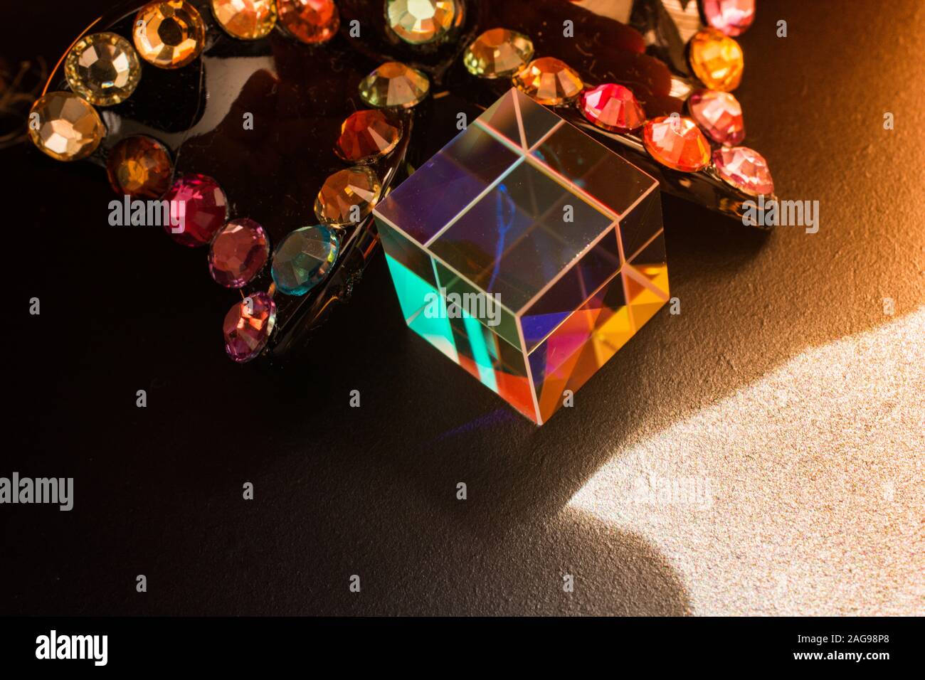 Optical glass cube Light dispersion,spectrum. Physics optics ray refractions Stock Photo