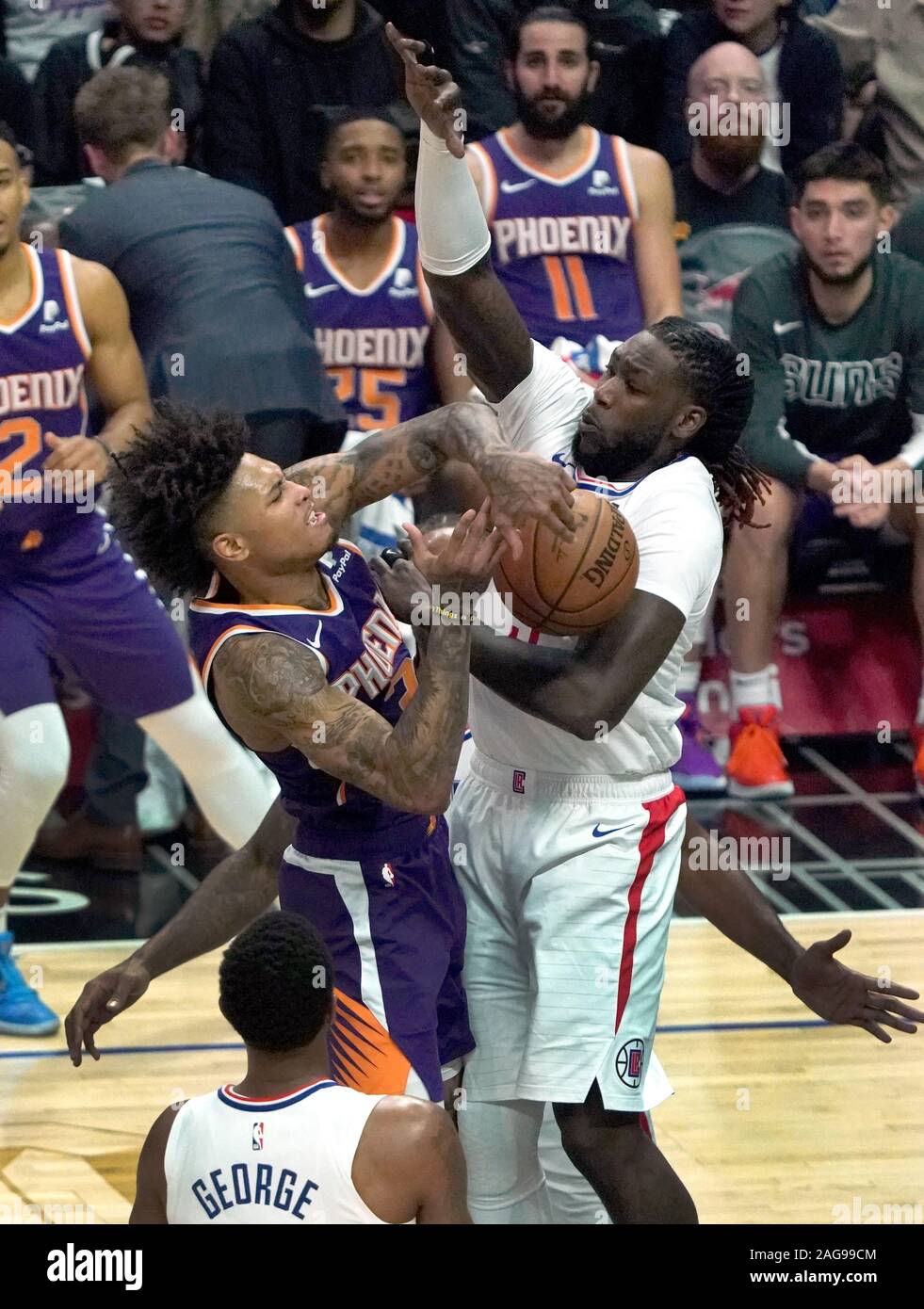 Phoenix Suns Kelly Ombre Jr (L) and Los Angeles Clippers Montrezl Harrell battle for the ball in third quarter action at Staples Center in Los Angeles Tuesday, December 16, 2019.  Photo by Jon SooHoo/UPI Stock Photo