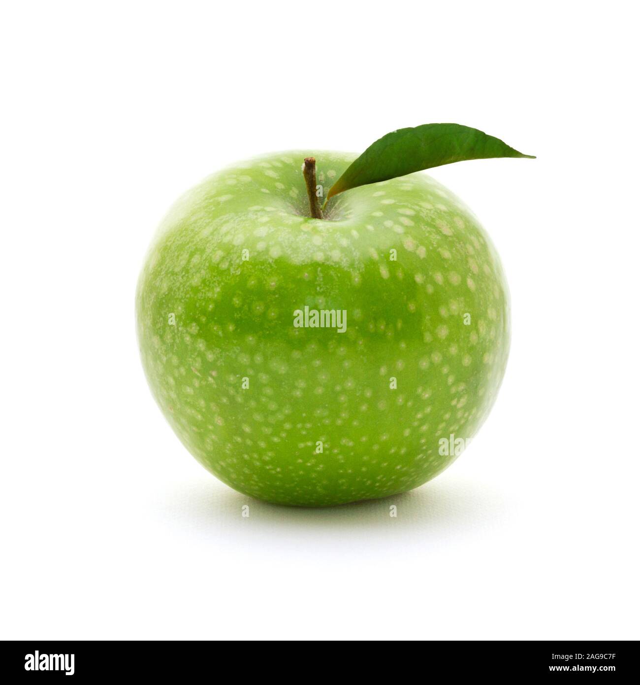 Ripe green apple with leaf isolated on white background. Health, food, vegan concept Stock Photo