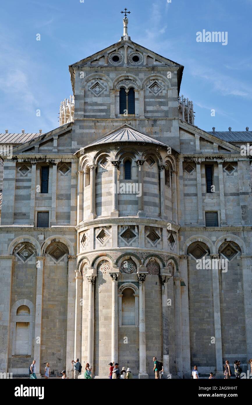 Pisa Cathedral facade and tourists a medieval Roman Catholic cathedral in the Piazza dei Miracoli Pisa Tuscany Italy EU - Romanesque architecture Stock Photo