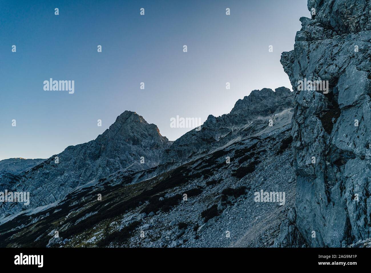 A low angle shot of a mountainous scenery under the clear sky in Totes  Gebirge, Austria Stock Photo - Alamy