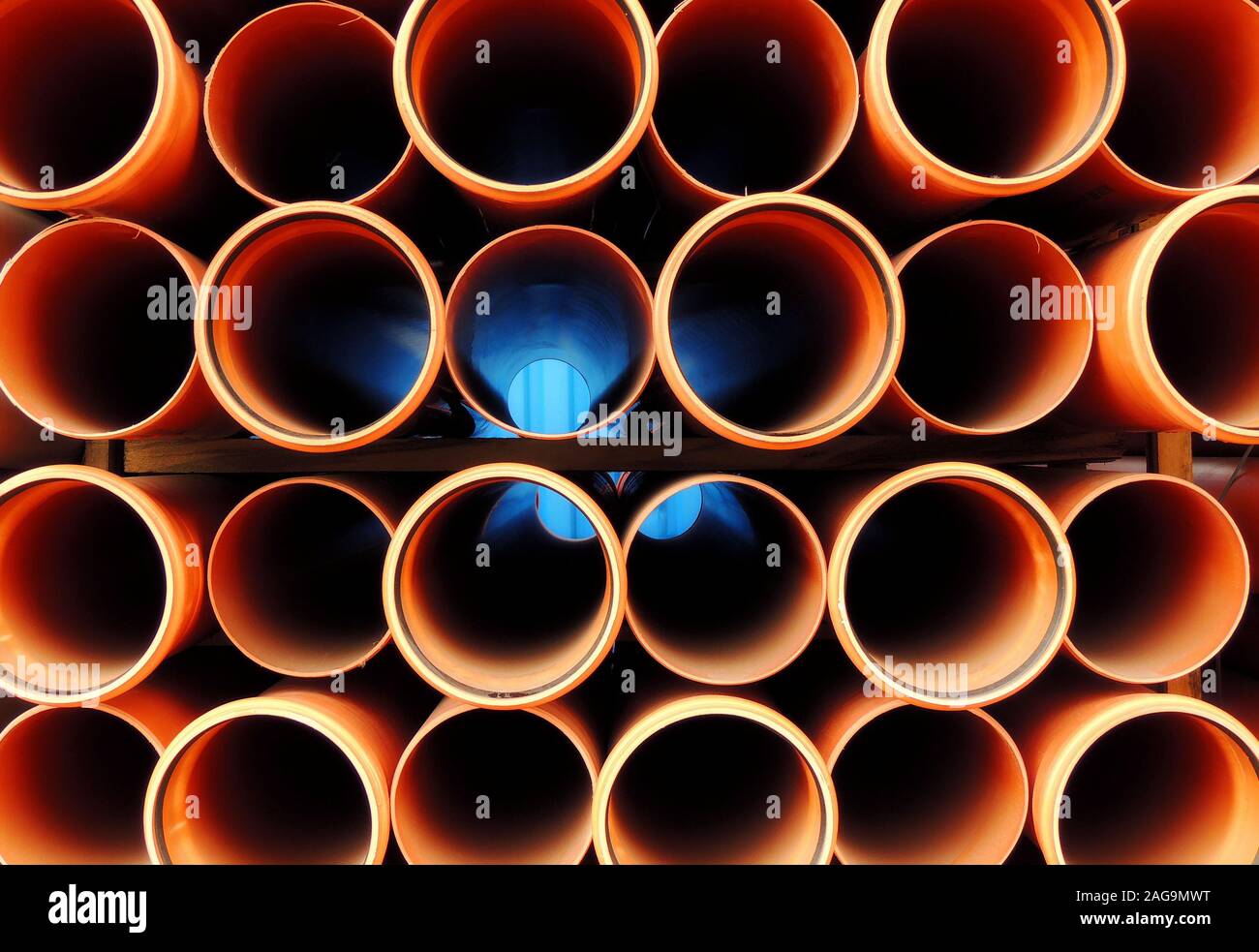 Plastic Orange Water Pipes Stacked Close Up Stock Photo Alamy