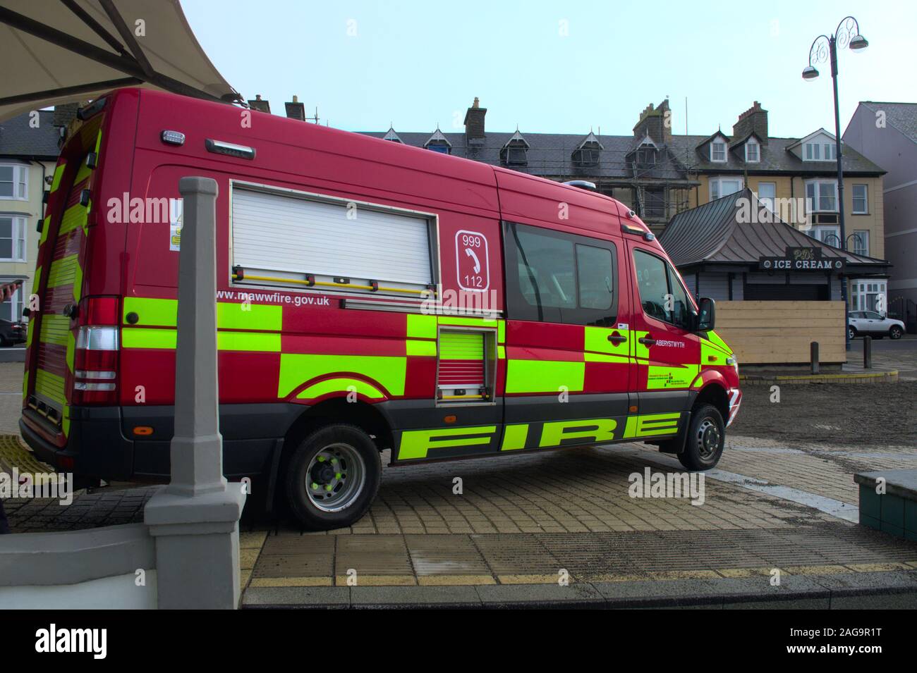 Mid and West Wales Fire Brigade [Fire and Rescue] parked on the promenade outside the bandstand Stock Photo