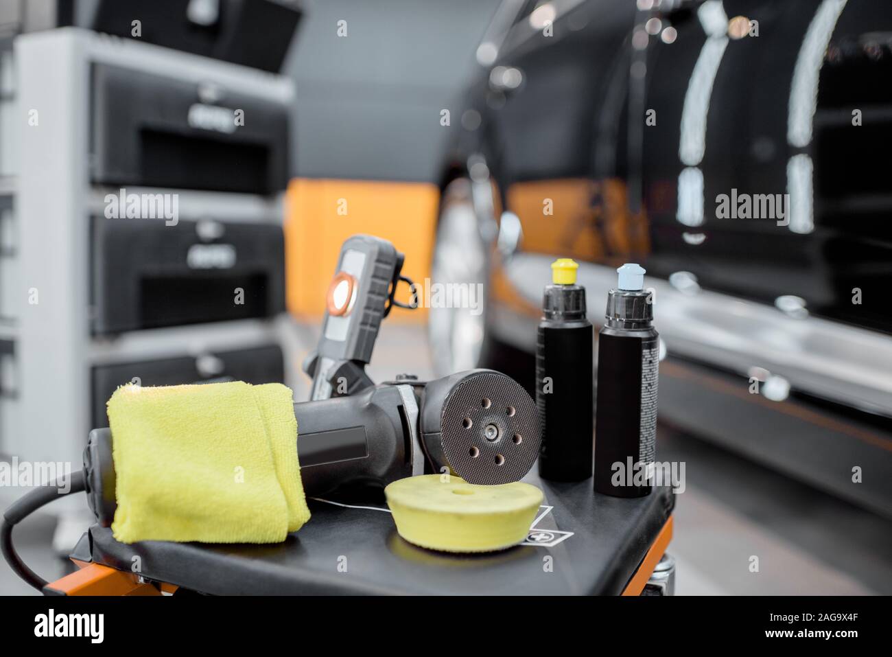 Professional equipment for automotive body polishing at the car service. Car detailing tools for vehicle care Stock Photo