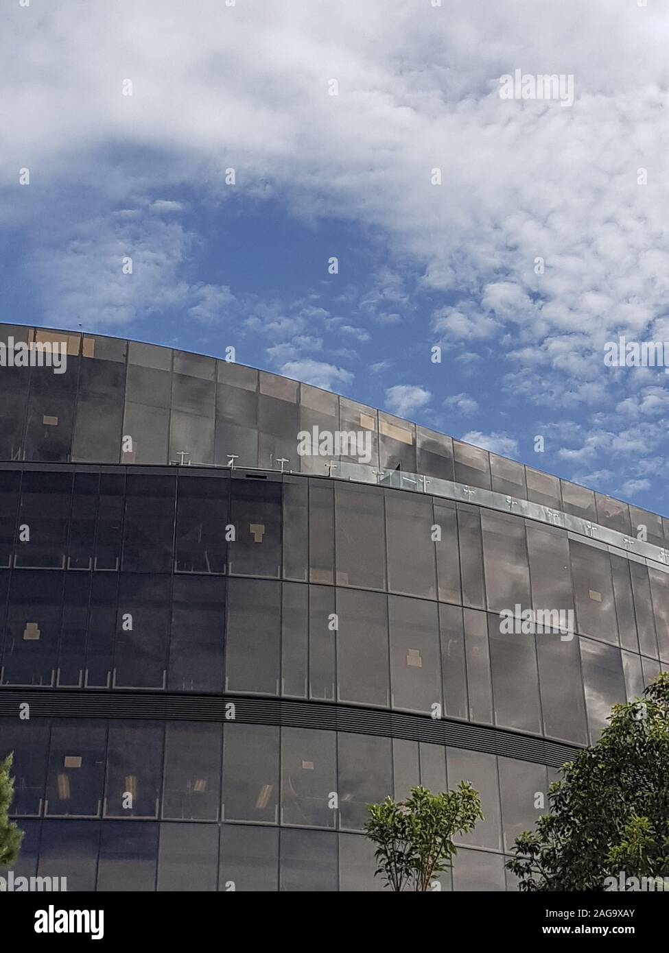 Vertical low angle shot of a modern architecture building under the ...