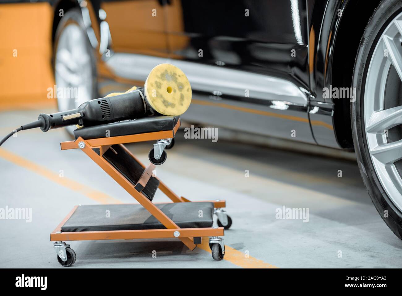 Professional equipment for vehicle body polishing at the car service Stock Photo