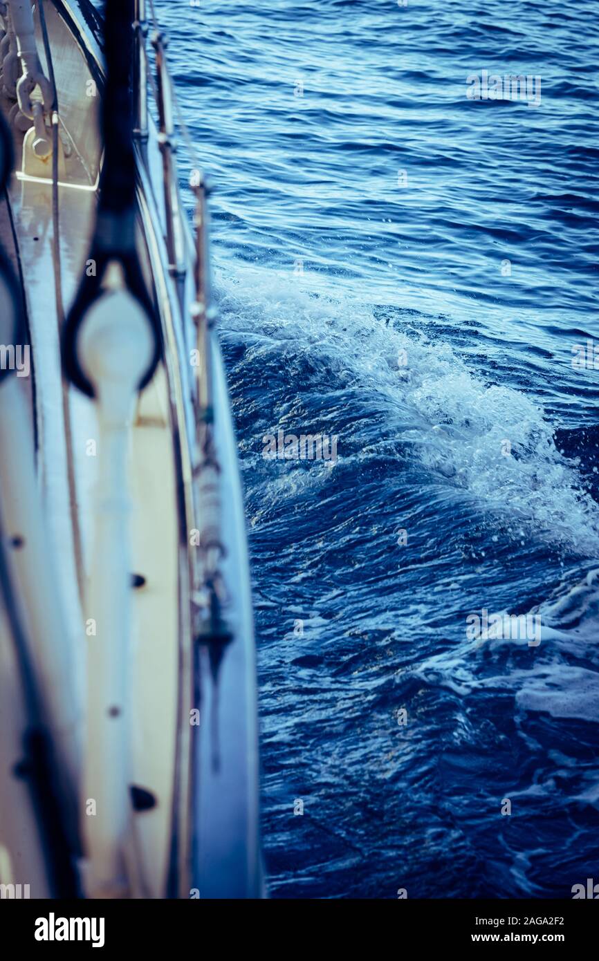 Vertical shot of a part of a schooner sailing in the sea Stock Photo ...
