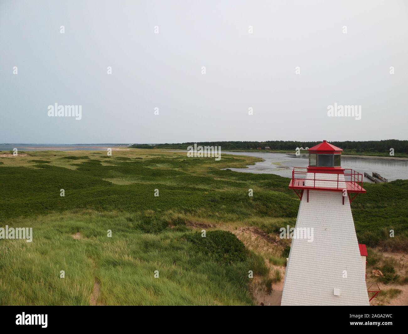 Aerial view of St. Peter's Harbour Lighthouse and St. Peter's Bay, Coastal Shore, Prince Edward