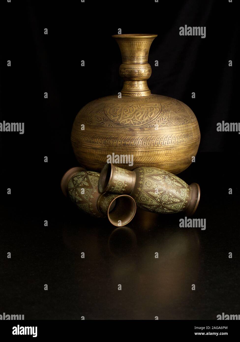 Classical Still Life Setting With Brass And Copper Urn And Vases