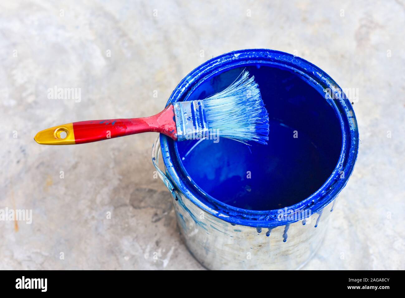 Blue Paint Bucket with Paint Brush Stock Photo - Alamy