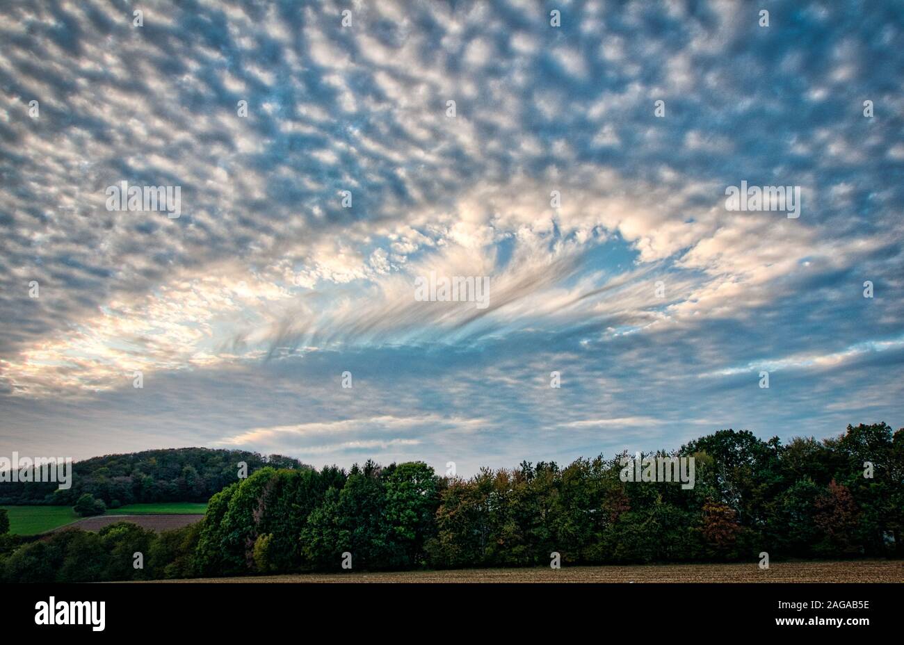 hole punch cloud in the sky Stock Photo
