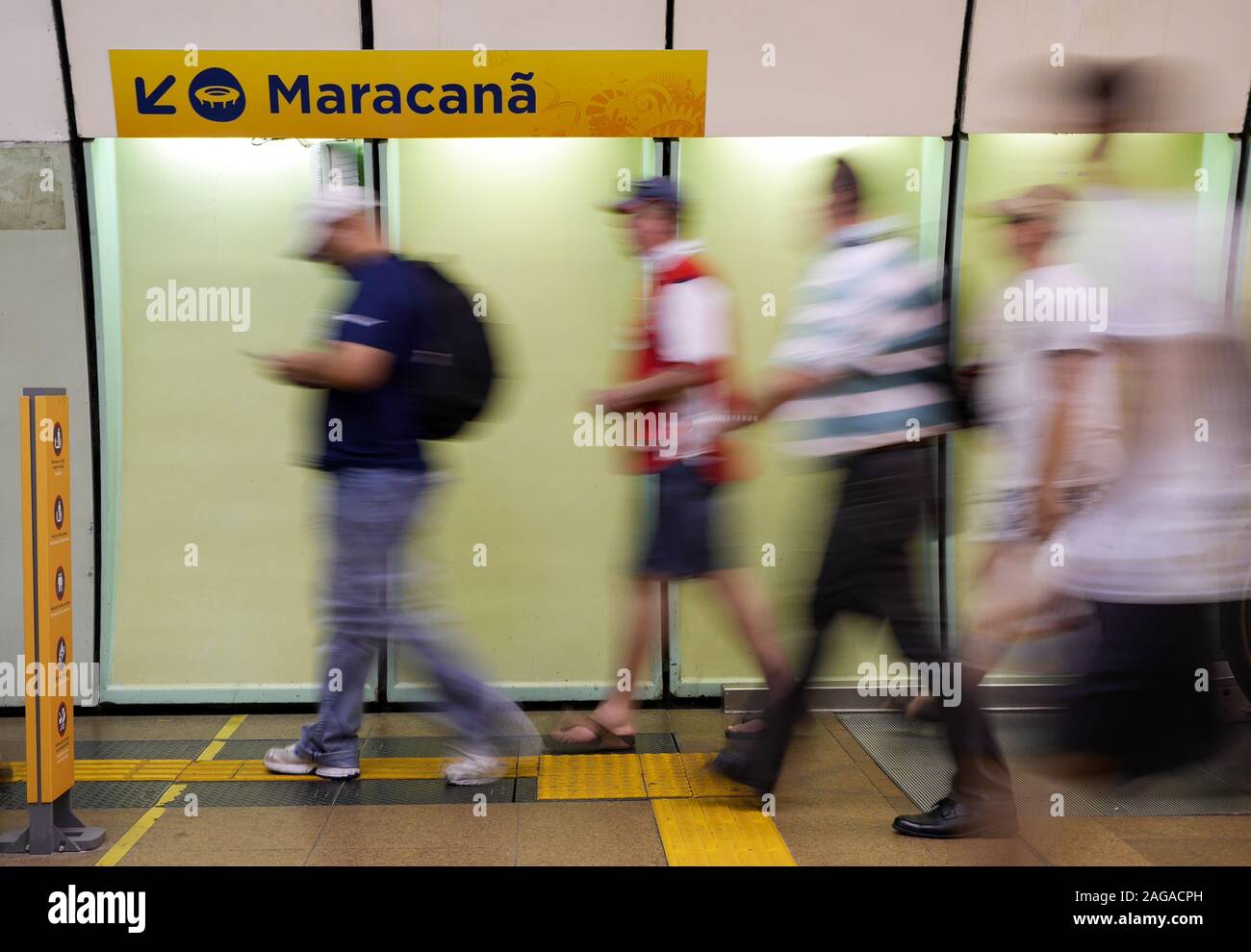 Brazilian Football Fans. Long exposure motion blur of soccer fans on the MetroRio subway to the Maracana football stadium; Rio de Janeiro, Brazil. Stock Photo