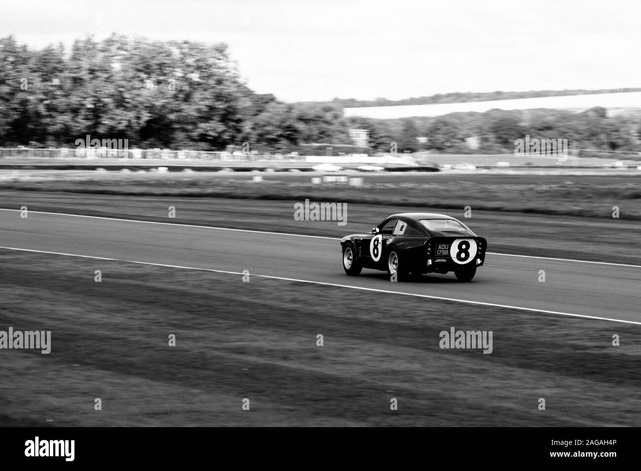 GOODWOOD, UNITED KINGDOM - Sep 09, 2017: A high angle shot of a beautiful black sports car riding in Goodwood city of the UK Stock Photo