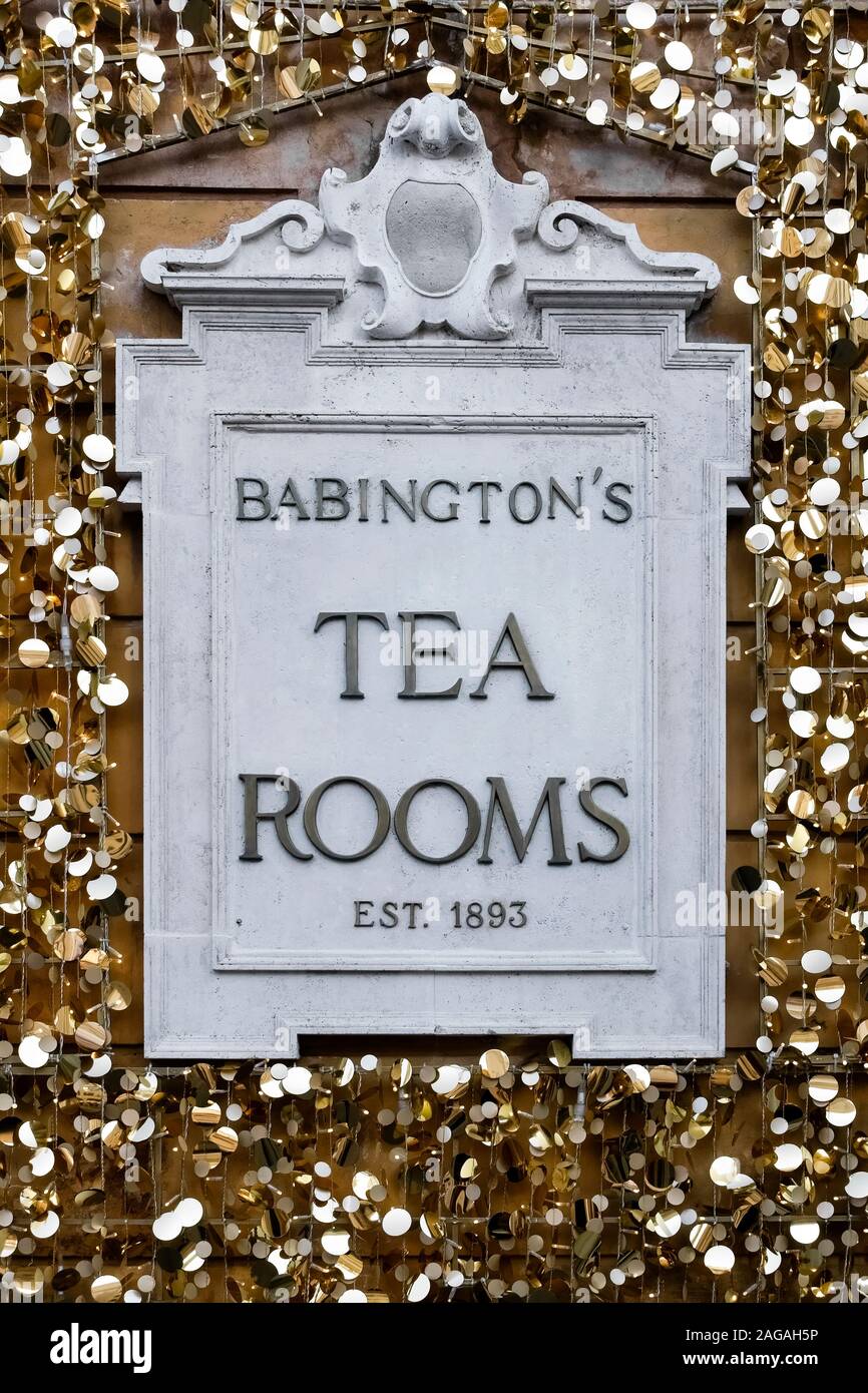 Golden Christmas decorations, Babington's English Tea Rooms and Cafe sign, at the Spanish Steps (Piazza di Spagna). Rome, Italy, Europe, EU. Stock Photo