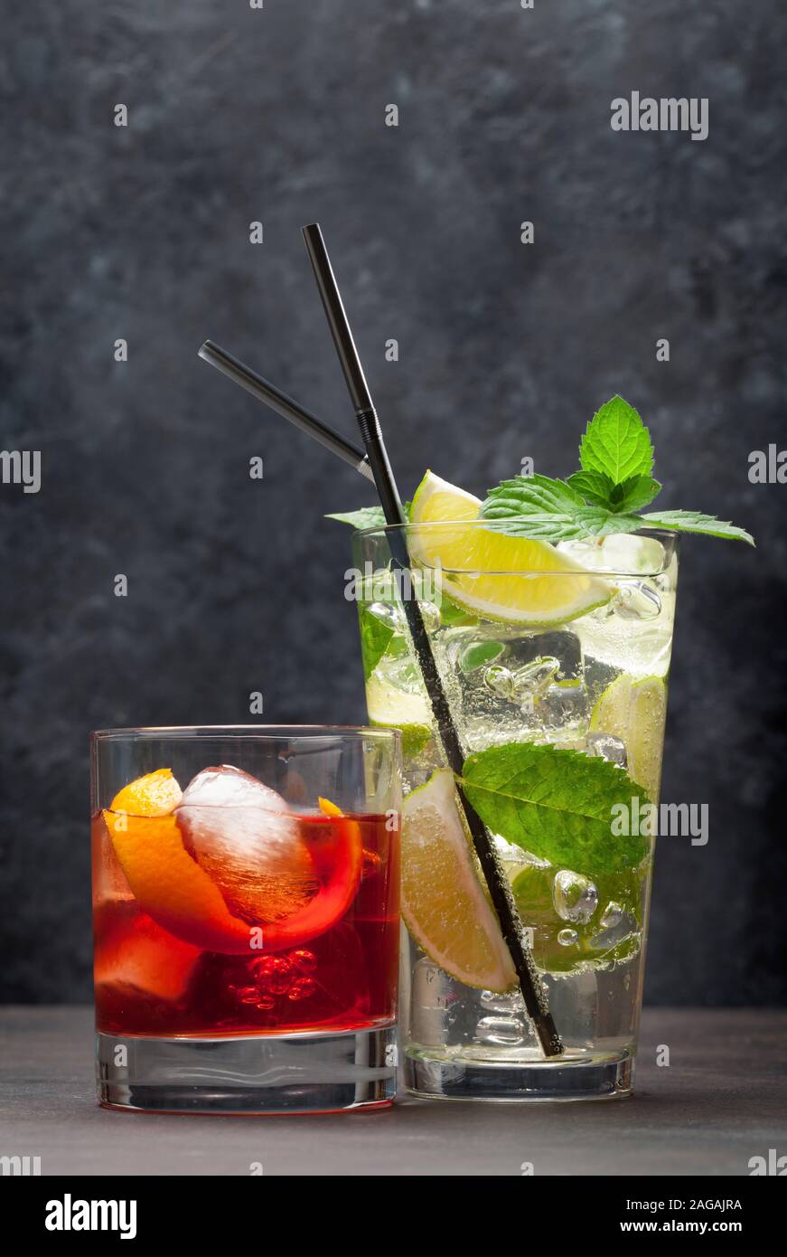 Two Classic Cocktail Glasses On Wooden Table Negroni And Mojito With Copy Space Stock Photo Alamy Two Classic Cocktail Glasses On Wooden Table Negroni And Mojito With Copy Space Stock Photo Alamy