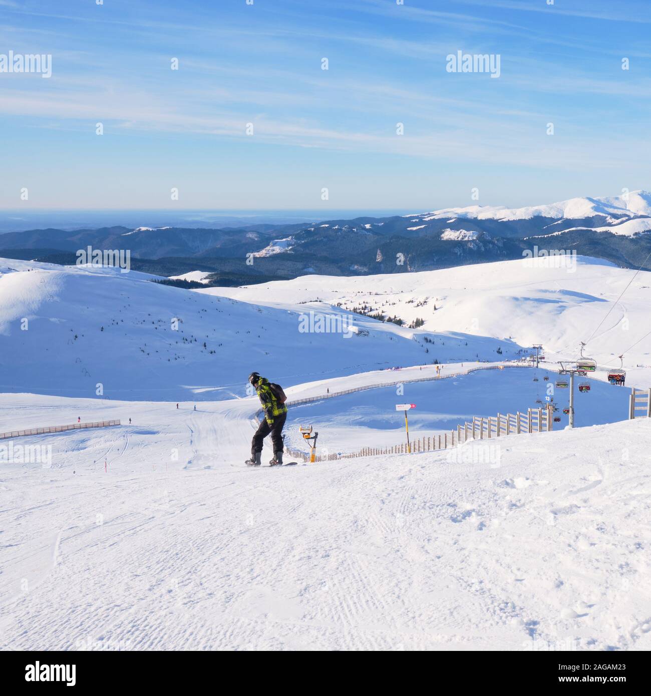 Sinaia, Romania - December 16, 2019: Snowboarder descending a ski slope at  Cota 2000, Sinaia ski resort, on a sunny early morning. Popular destination  Stock Photo - Alamy