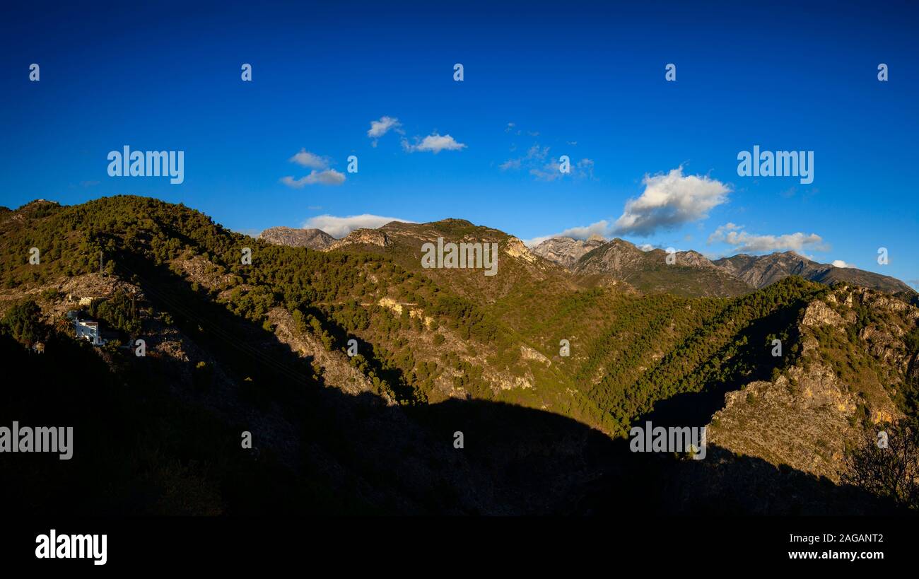 The Sierra de Enmedio, mountain massif rising a behind Frigiliana in the province of Malaga, Andalusia, Spain. Stock Photo