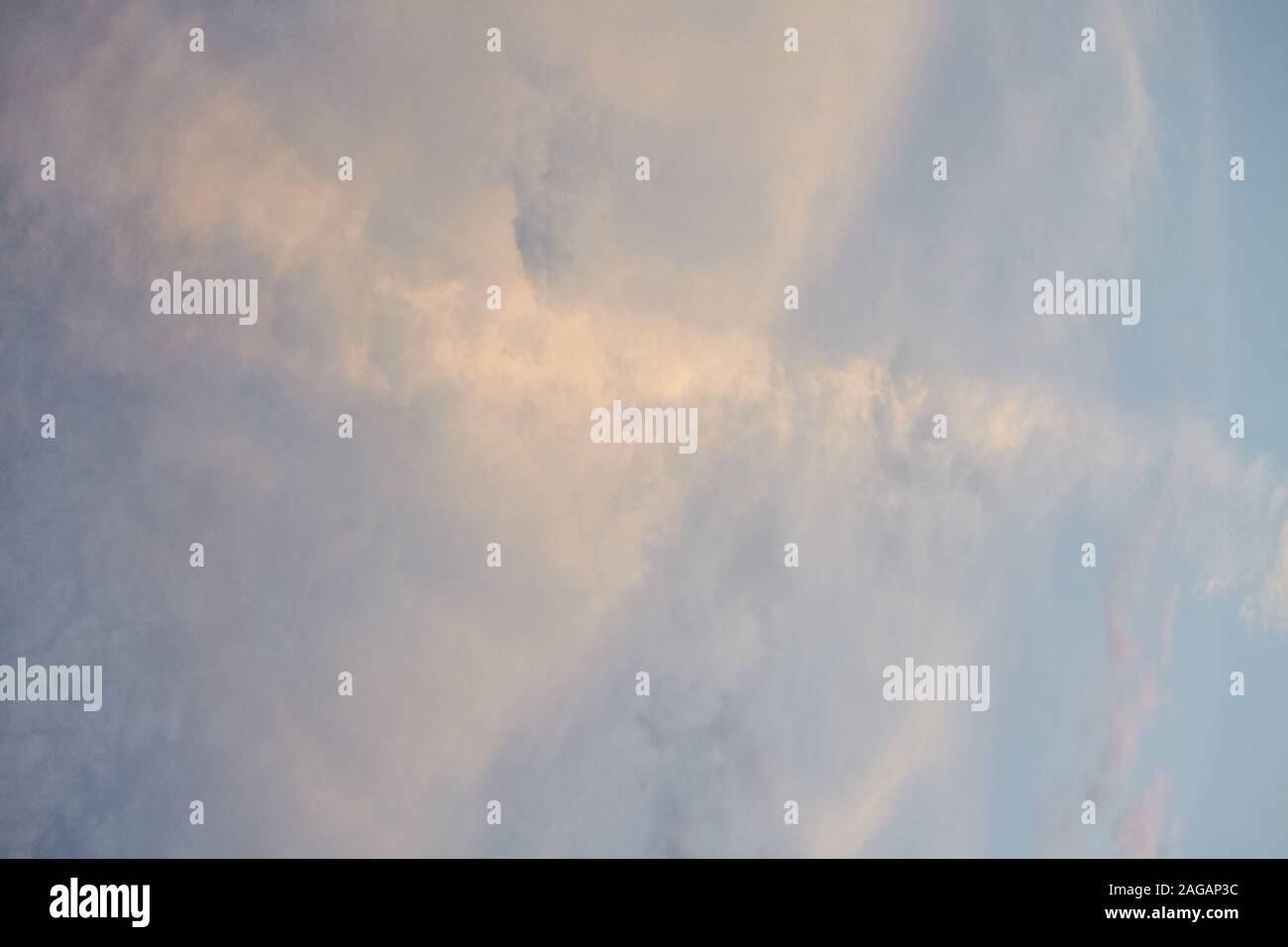 Low angle shot of the beautiful cloudy sky with the sun shining under ...