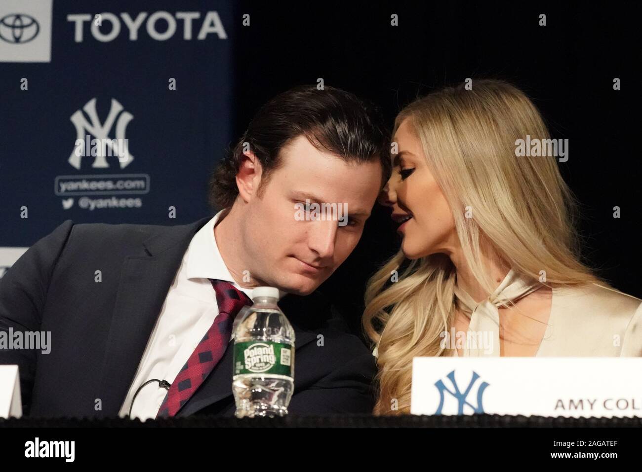 Bronx, United States. 18th Dec, 2019. Gerrit Cole and his wife Amy Cole  speak as the New York Yankees hold a press conference introducing their new  $324 million pitcher Gerrit Cole at