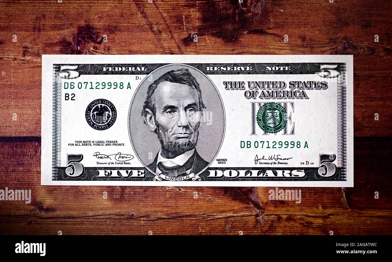 United States five-dollar bill features the 16th U.S. President (1861-65), Abraham Lincoln Stock Photo