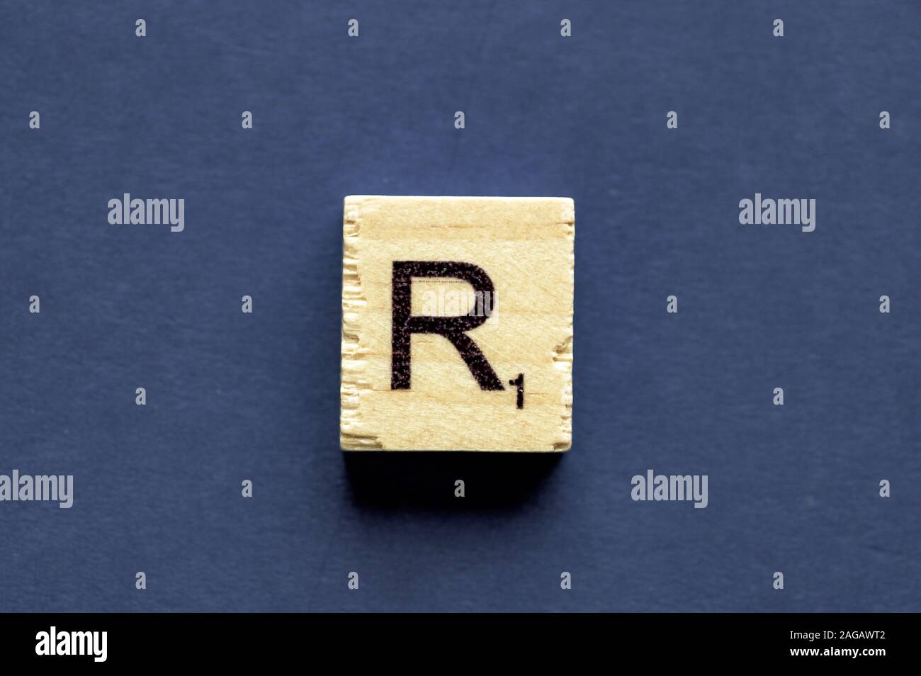 Letter R on a wooden cube from a wordplay board game Stock Photo - Alamy