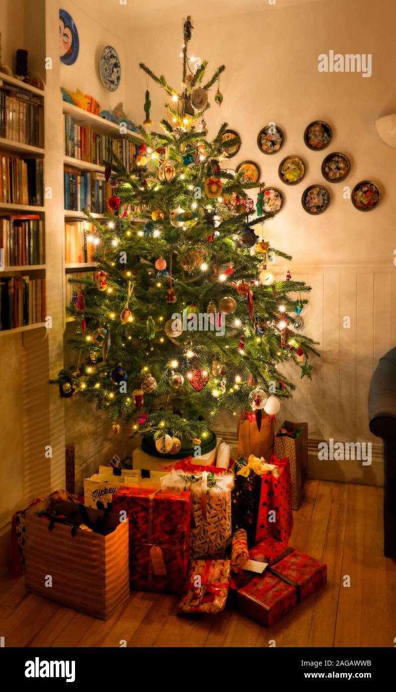 Blue spruce Christmas tree with vintage decorations in home in London UK Stock Photo